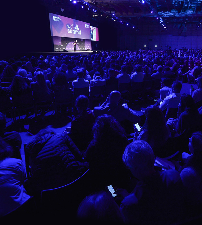 PandaConf stage at Web Summit, seen from the dark audience